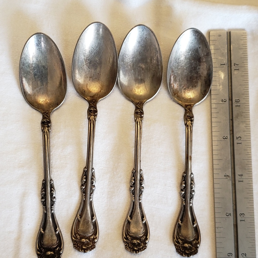 Lot of 4 Rogers Silver plated fancy spoons